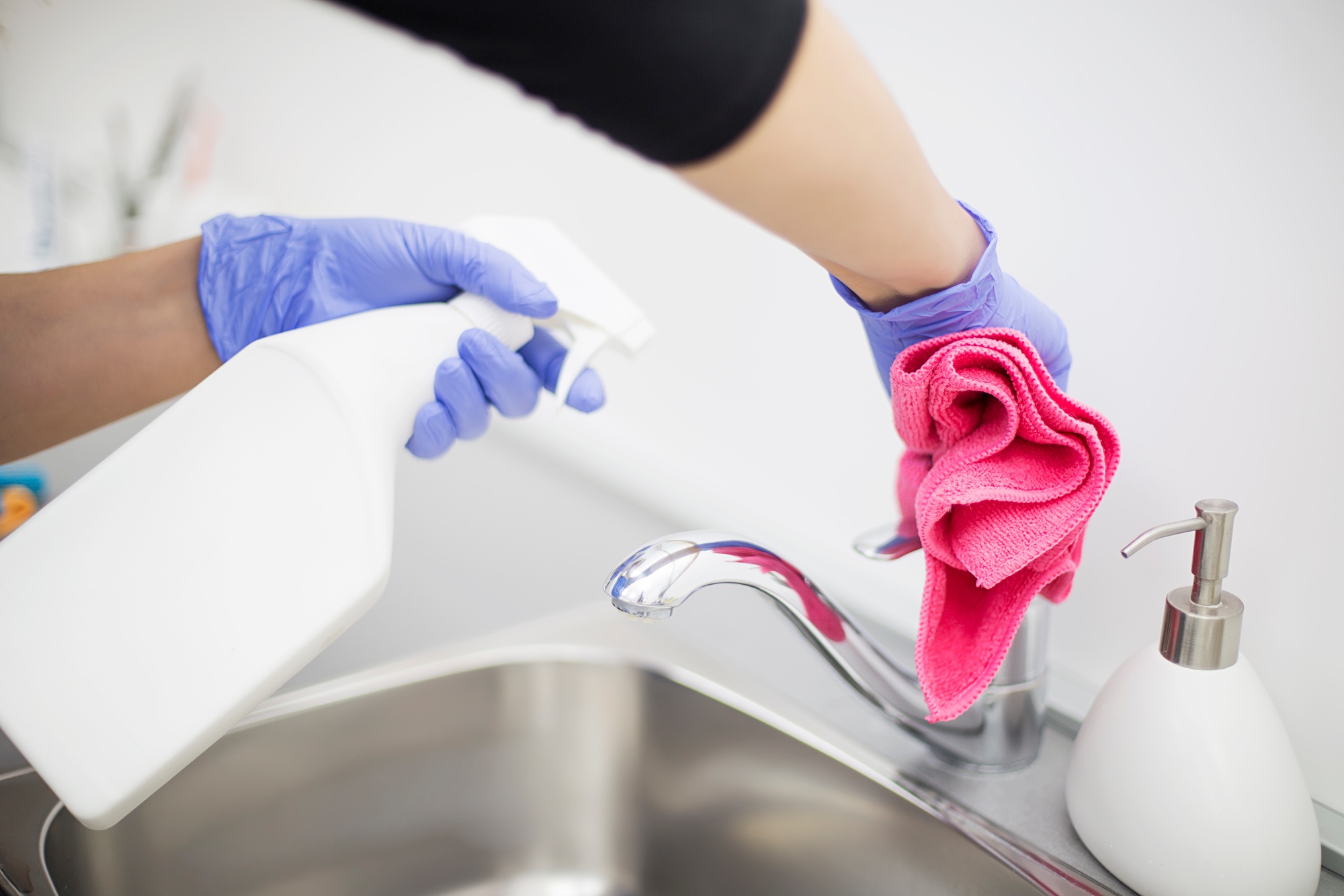 Cleaning lady cleans cleaning tap