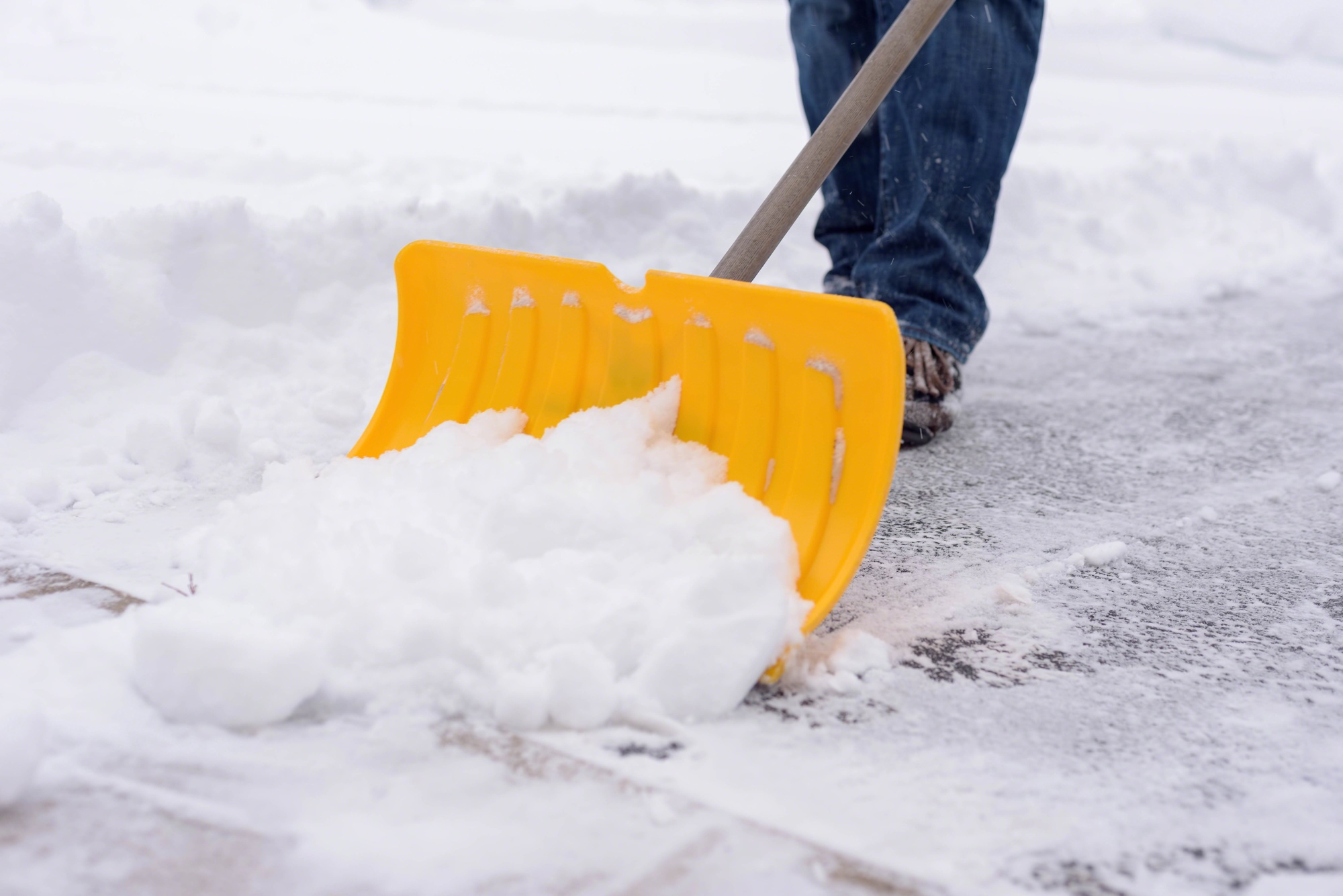 Shoveling snow in winter